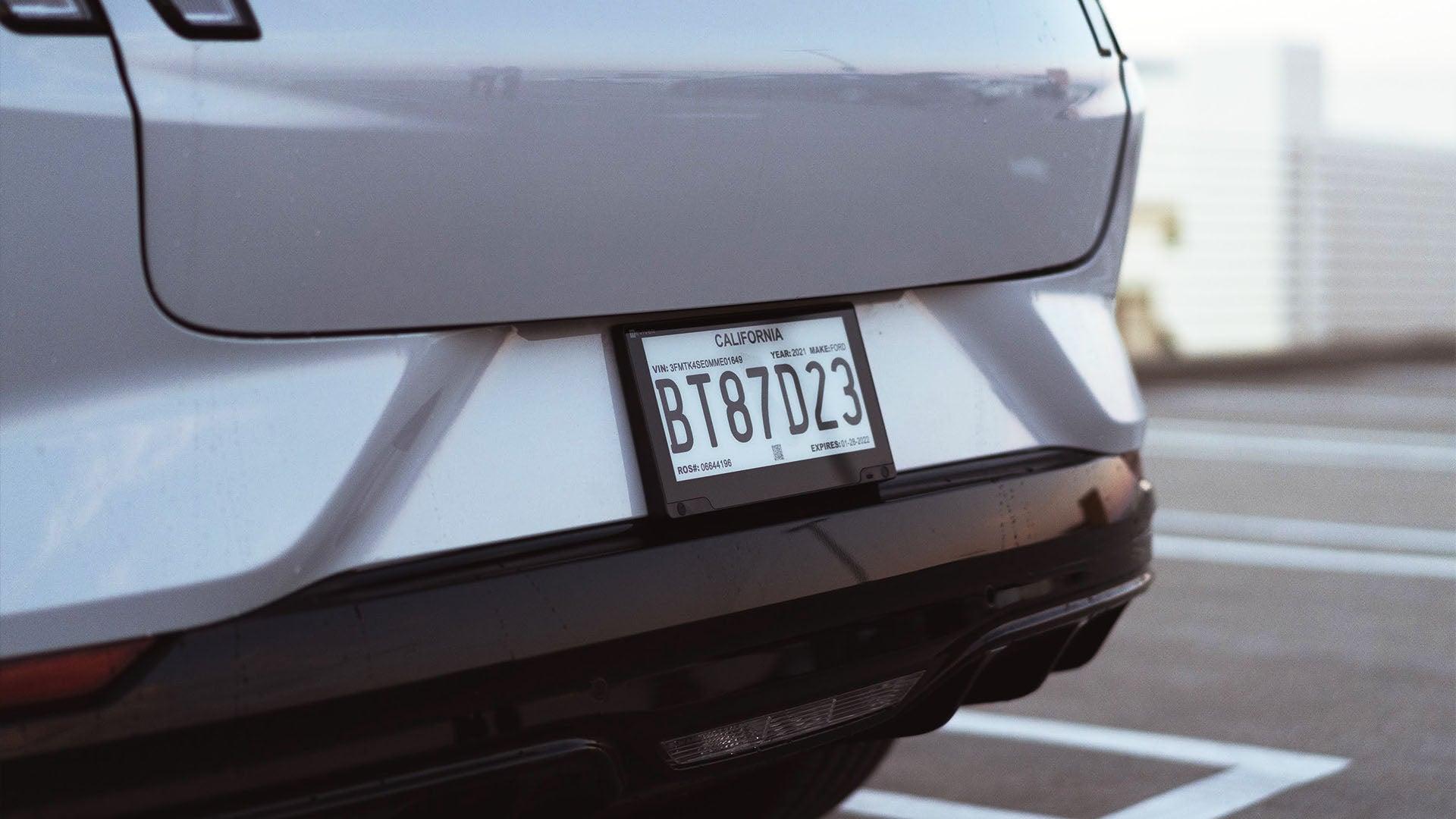 Silver sedan with a Reviver RPlate on the rear