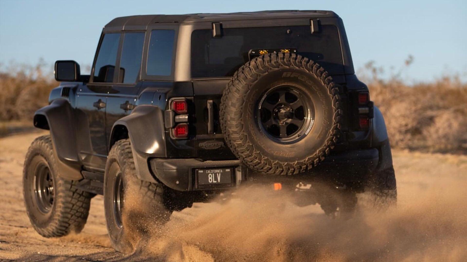 Black Ford Bronco off-road with a Reviver RPlate