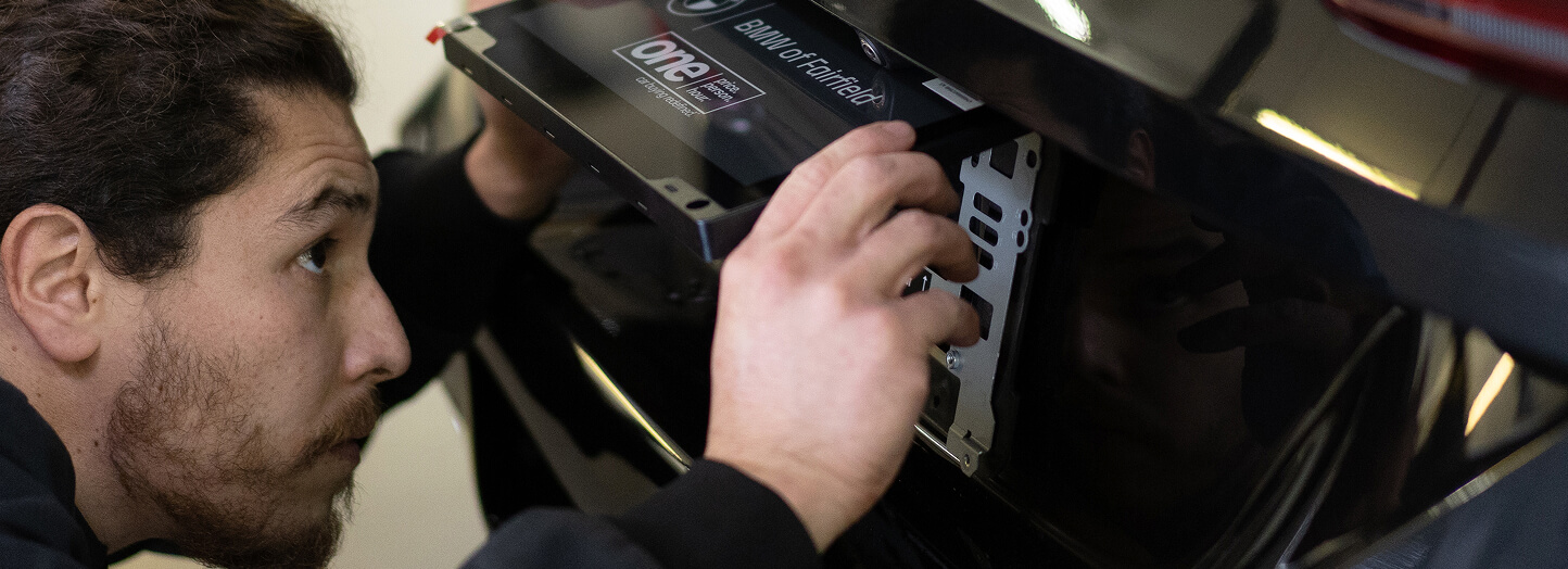 Reviver anti-theft mounting bracket installed on a vehicle